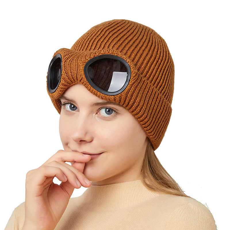 Knit beanie with flip-up goggles on front