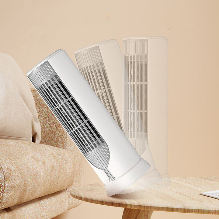 White ceramic tower heater on a desk