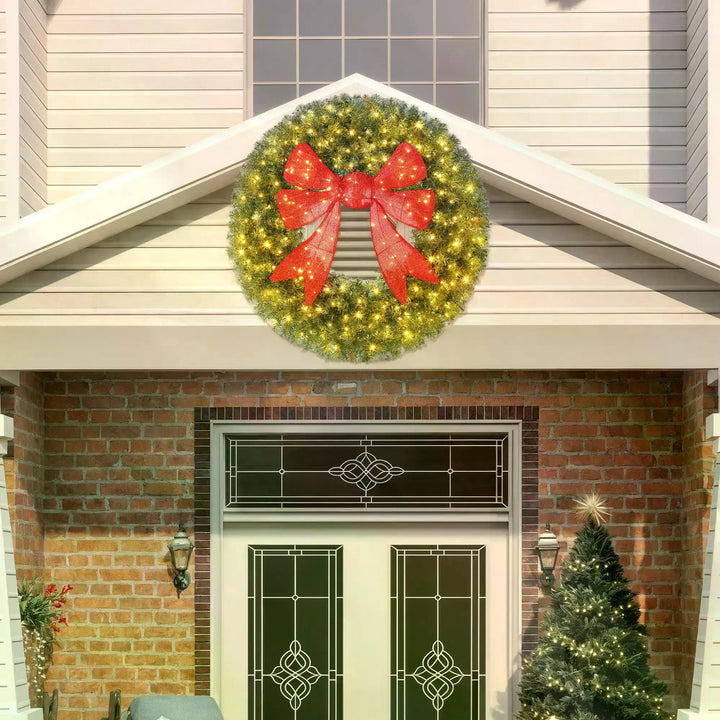 Giant lighted Christmas wreath with red bow