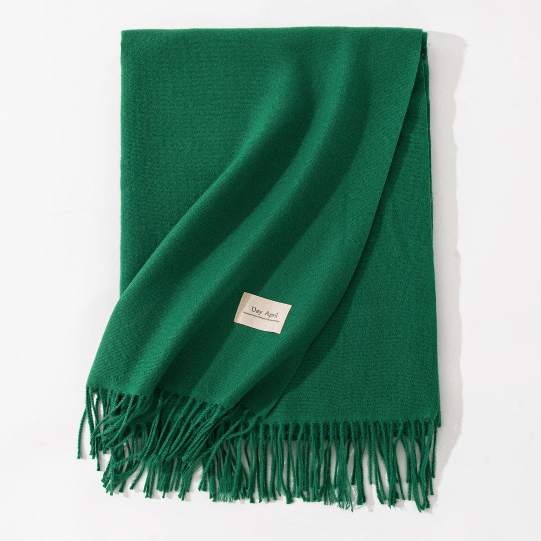 Woman wearing a wide caramel scarf shawl