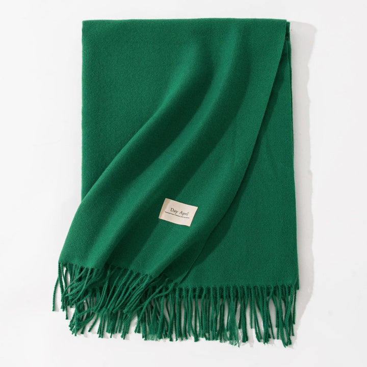 Woman wearing a wide caramel scarf shawl