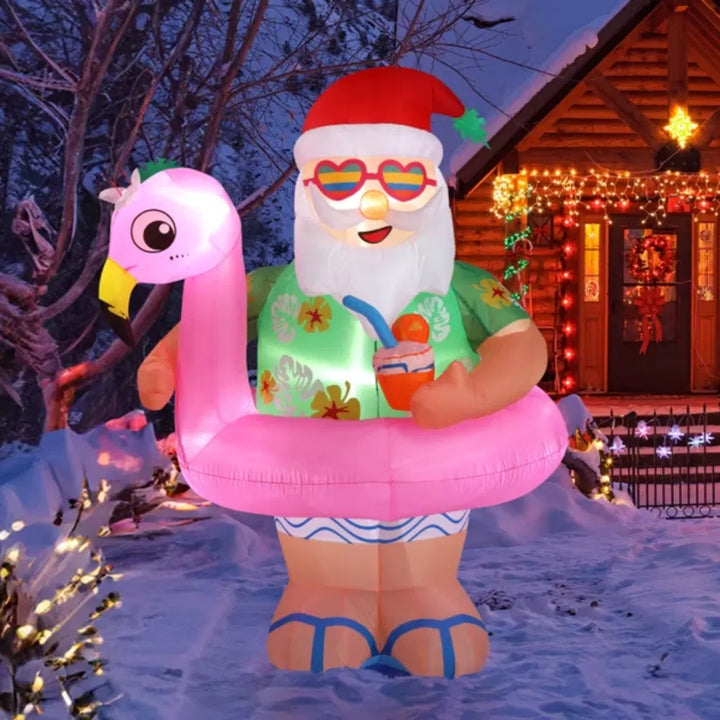Inflatable Santa on pink flamingo float