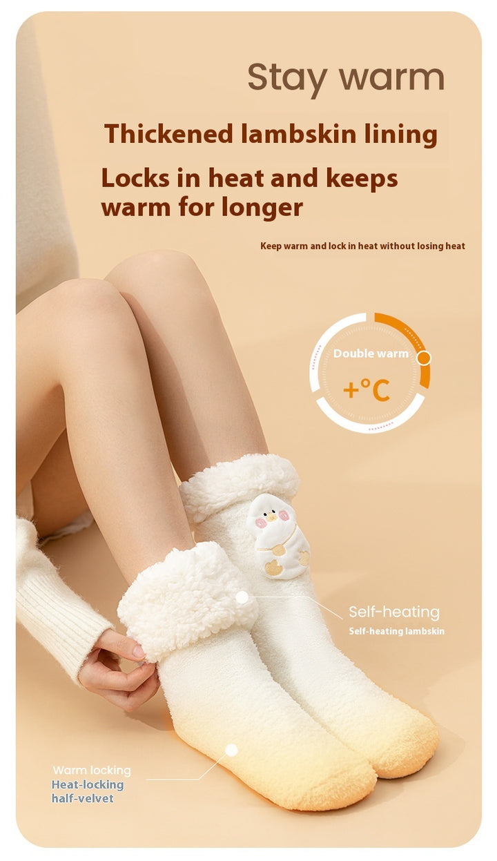 Plush heated socks with a pink deer badge