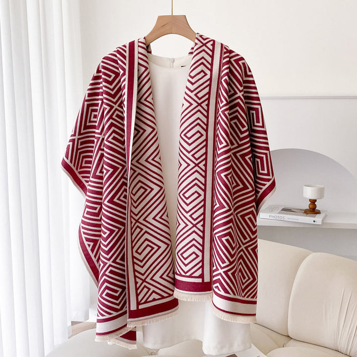 Woman wearing fringe shawl cape